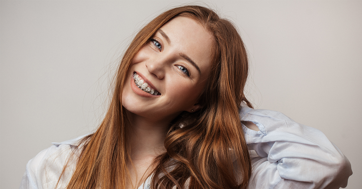 smiling woman with braces
